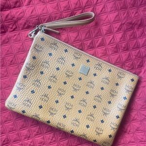 MCM Tan Wristlet Clutch with Logo Pattern